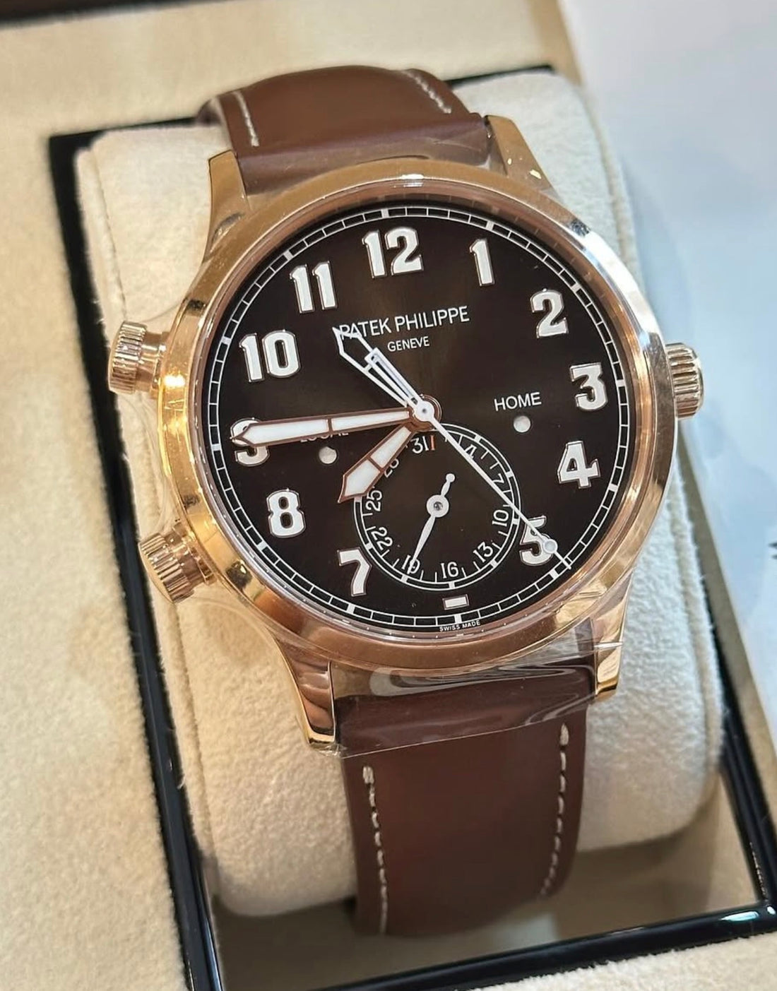 Patek Philippe Calatrava Pilot Travel Time 5524R-001 three-quarter dial view in box