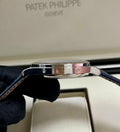 Patek Philippe Annual Calendar 5396G-017 in white gold with blue dial and blue alligator strap, left-side case profile