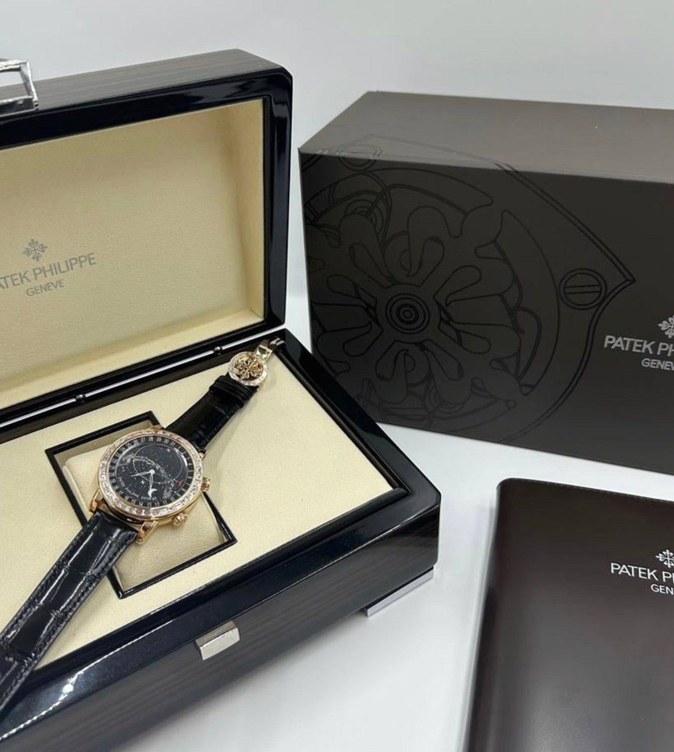 Patek Philippe Celestial 6104R-001 in rose gold with celestial dial, diamond bezel and black alligator strap, display with open presentation box