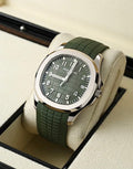 Patek Philippe Aquanaut 5168G-010 green dial, three-quarter view in presentation box