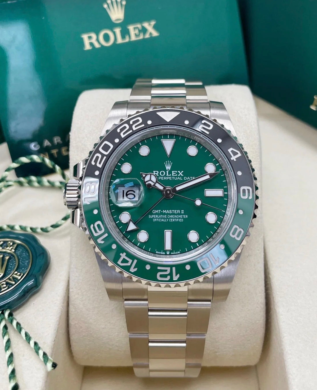 Rolex GMT-Master II 126729VTNR in white gold with green dial and black-and-green Cerachrom bezel, front view