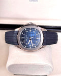 Patek Philippe Aquanaut 5168G-001 in white gold with blue embossed dial and blue composite strap, horizontal straight-on front close-up