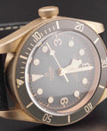 Tudor Black Bay Bronze M79250BA-0001, slate-gray dial and bezel with black nubuck strap, right three-quarter front view