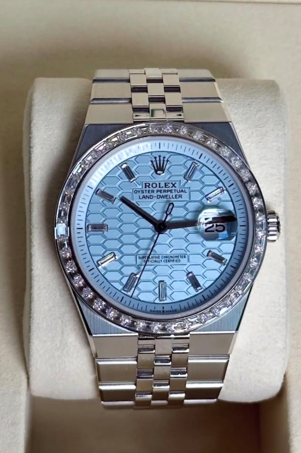 Rolex Land-Dweller 40 reference 127386TBR with ice-blue diamond dial and factory baguette diamond bezel