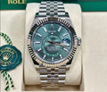 Rolex Sky-Dweller 336934 green dial on Jubilee bracelet, straight-on view in Rolex box