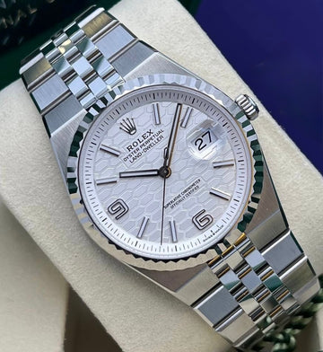 Rolex Land-Dweller 36 White Gold Oystersteel Intense White Honeycomb Motif Dial Fluted Bezel Flat Jubilee Bracelet 127234 - 2025