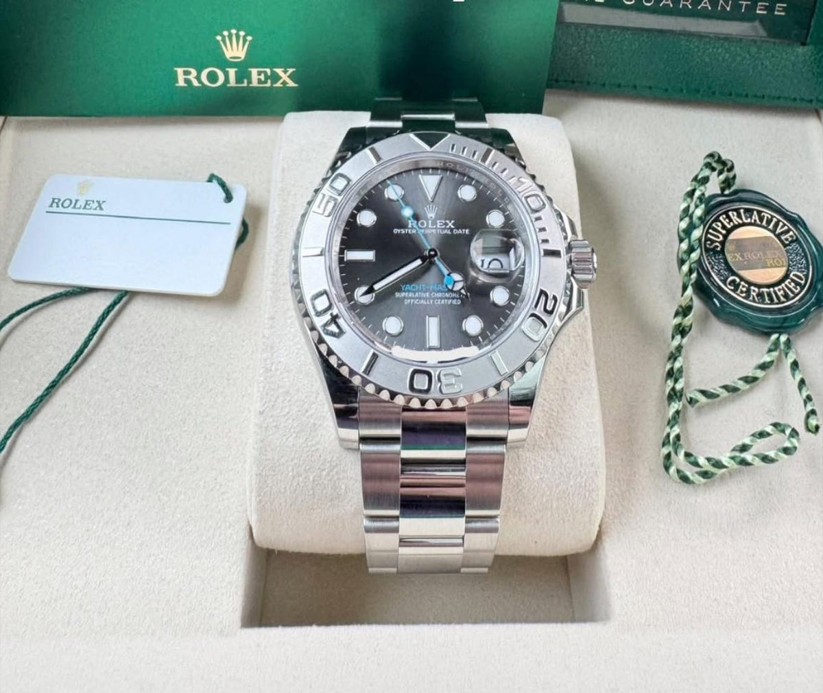 Rolex Yacht-Master 40 ref. 126622 with slate dial, platinum bezel and Oyster bracelet, front view with card and accessories