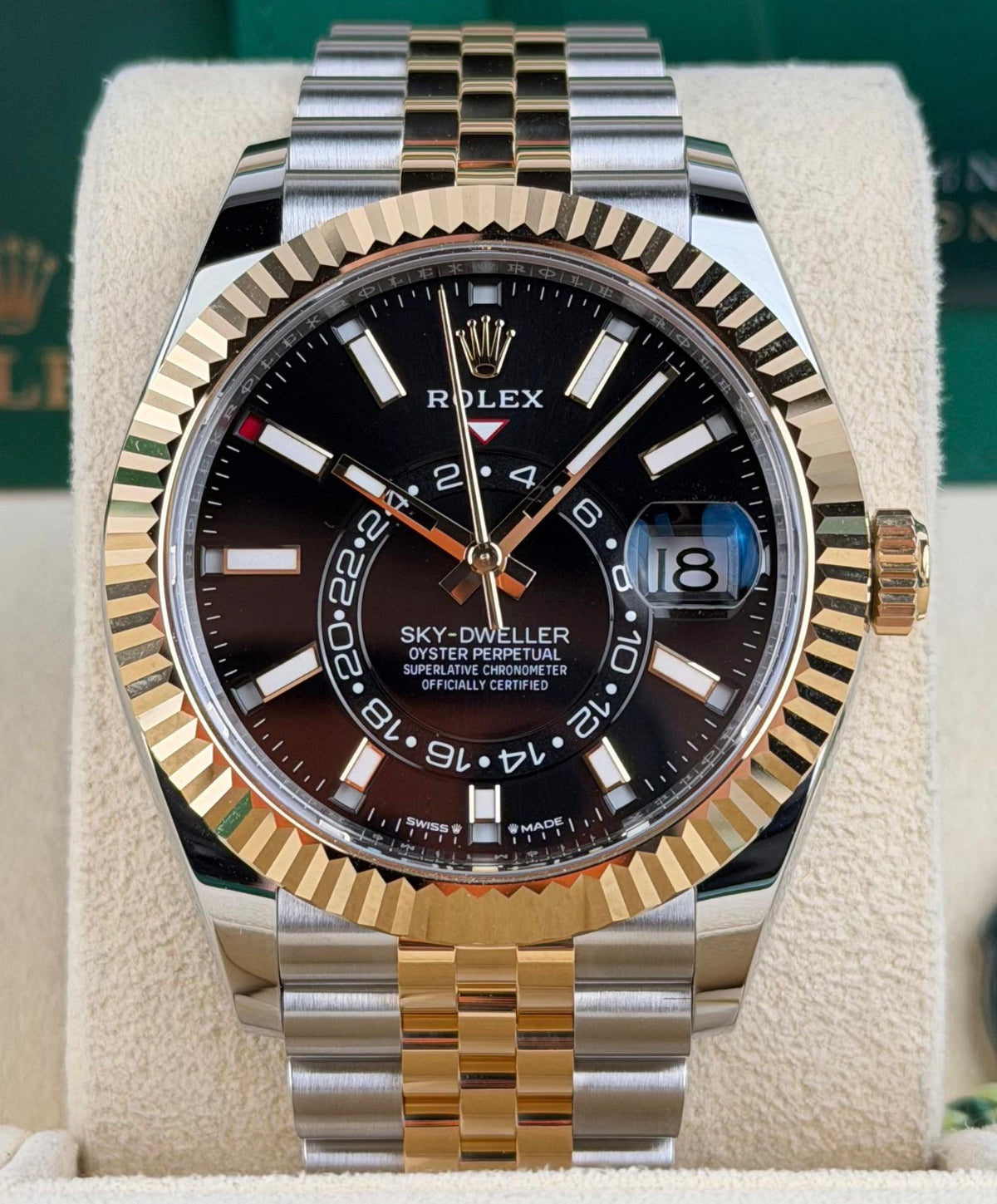 Rolex Sky-Dweller reference 336933 bright black dial on Yellow Rolesor Jubilee bracelet, straight-on front view