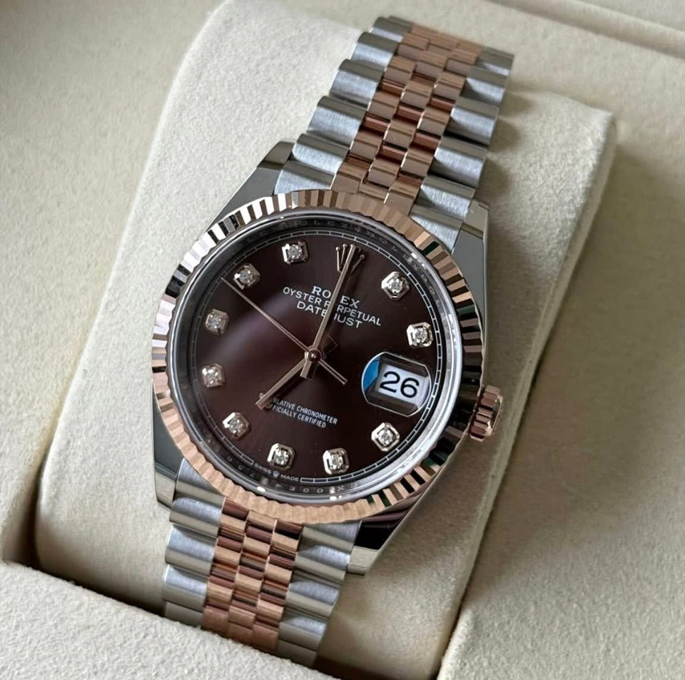 Rolex Datejust 36 Chocolate Diamond Dial Jubilee 126231, angled front view on a display cushion