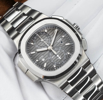 Patek Philippe Nautilus Travel Time 5990/1A GREY DIAL UNWORN