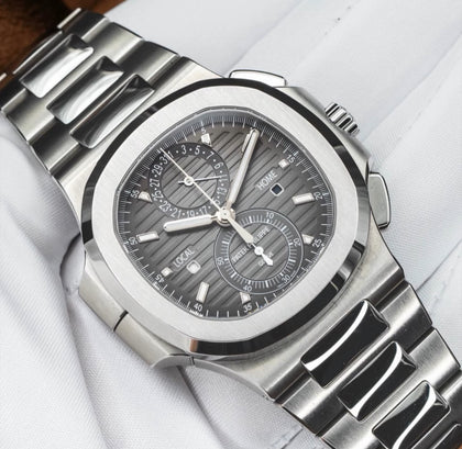 Patek Philippe Nautilus Travel Time Chronograph 5990/1A with gray dial and steel bracelet, angled front close-up