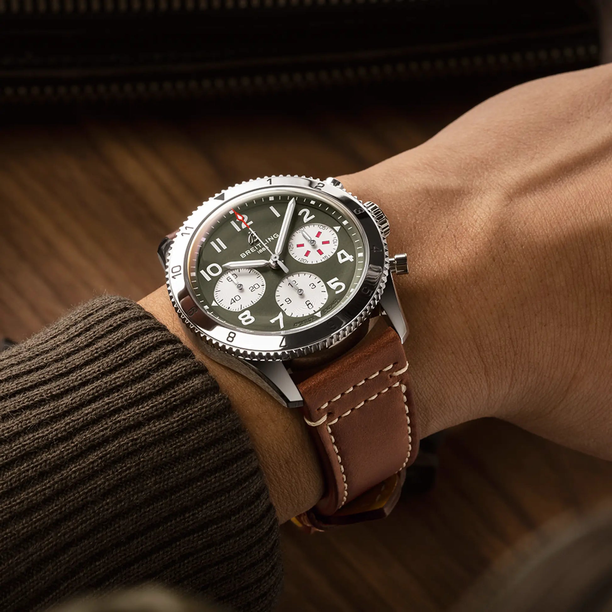 Breitling Classic AVI Chronograph 42 Curtiss Warhawk reference A233802A1L1X1 with Green dial, Stainless steel case, calfskin strap, on-wrist view