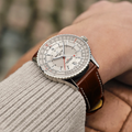 Breitling Navitimer Automatic GMT 41 reference A32310211G1P1 with Cream dial, Stainless steel case, alligator strap, on-wrist view