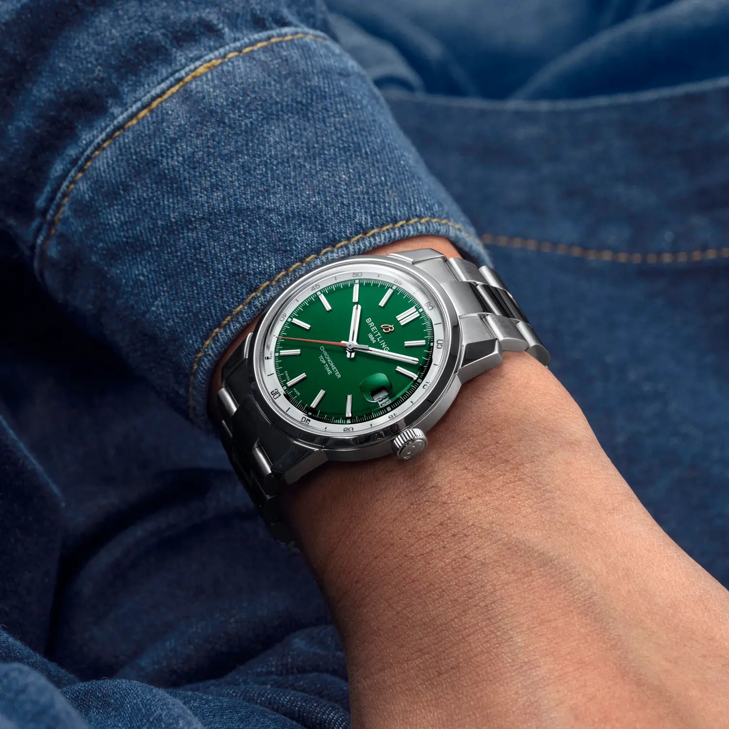 Breitling Top Time B31 reference AB3113A71L1A1 with Green dial, Stainless steel case, bracelet, on-wrist view