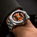 Breitling Aerospace B70 Orbiter reference EB70101A1O1E1 with Orange dial, Titanium case, bracelet, on-wrist view