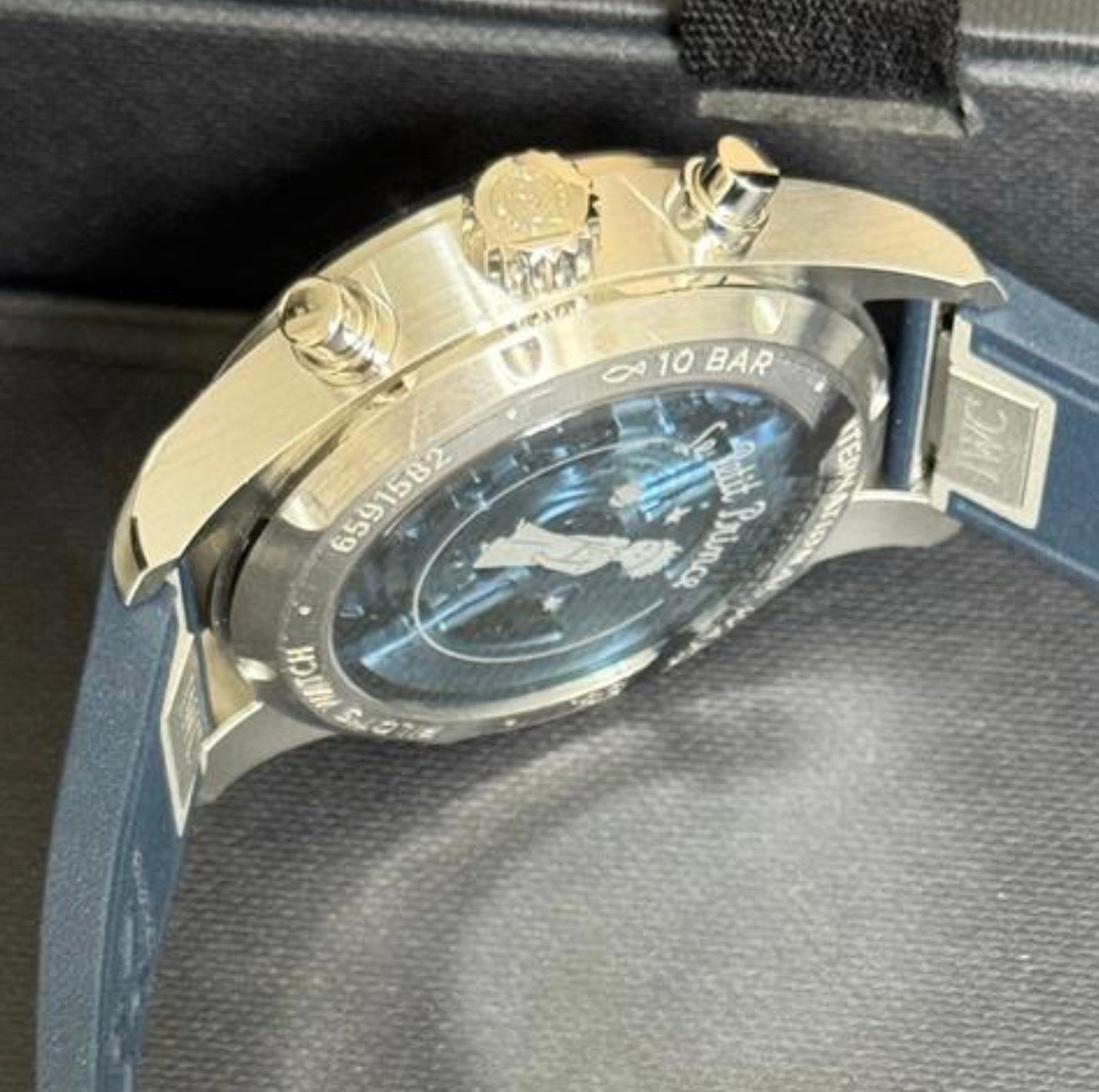 IWC IW388120 Le Petit Prince sapphire caseback and blue rubber strap