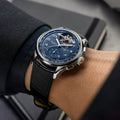 Breitling Premier B21 Chronograph Tourbillon 42 Willy Breitling reference LB2120171C1P1 with Blue dial, Platinum case, alligator strap, on-wrist view