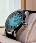 Omega Aqua Terra 41mm 220.32.41.21.03.001, crown-side view of turquoise dial and polished steel case