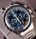 Omega Speedmaster First Omega in Space 310.30.40.50.06.001 grey-blue dial angled view