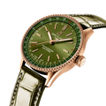 Breitling Navitimer Automatic 36 reference R17327371L1P1 with Green dial, 18k red gold case, alligator strap, three-quarter view