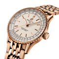 Breitling Navitimer Automatic 41 reference R17329F41G1R1 with Cream dial, Small scale traceable 18K red gold case, bracelet, three-quarter view