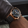 Breitling Super Chronomat B01 44 reference RB01362A1C1S1 with Blue dial, 18k red gold case, rubber strap, on-wrist view