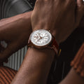 Breitling Navitimer B01 Chronograph 41 reference RB0139211G1P1 with Cream dial, 18k red gold case, brown alligator strap, on-wrist view