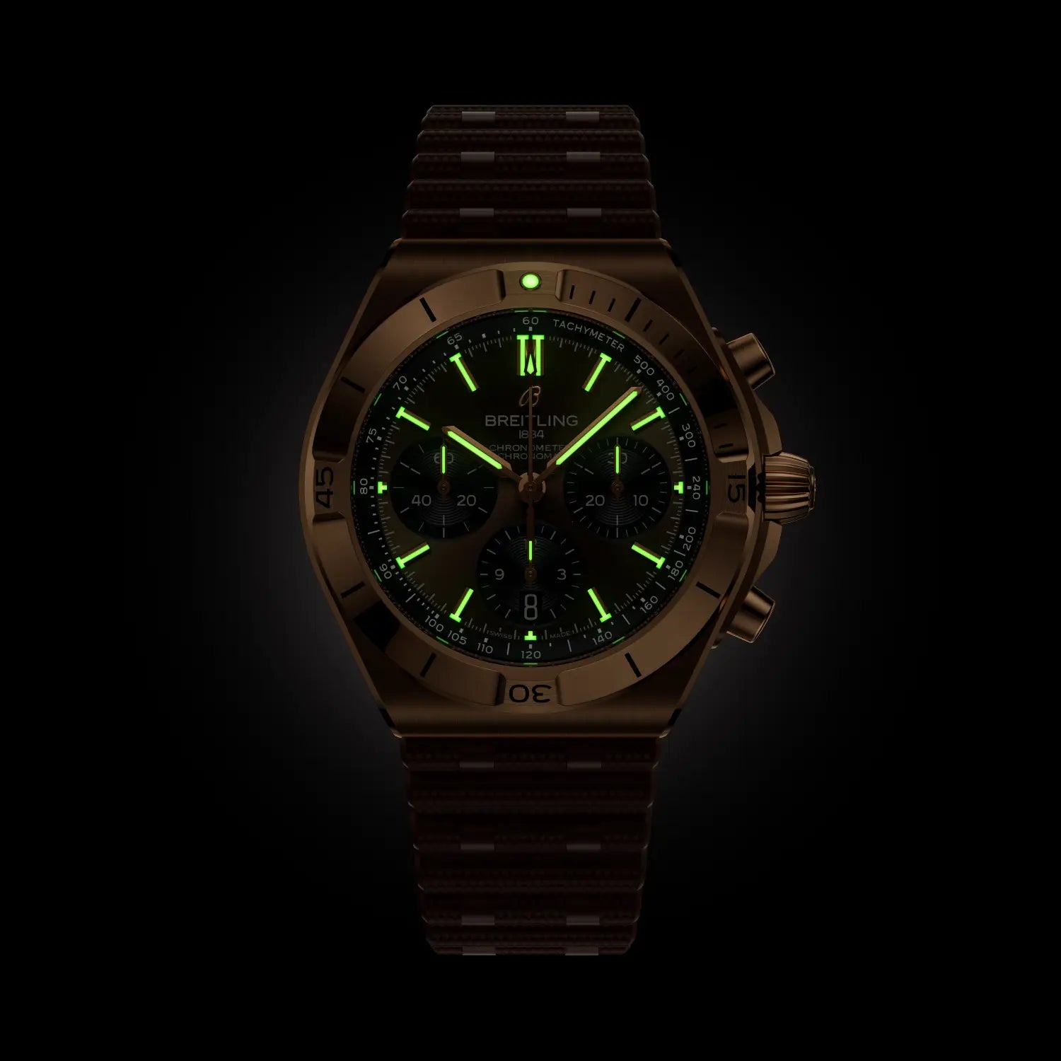Breitling Chronomat B01 Chronograph 42 reference RB0158101Q1S1 with Brown dial, 18k red gold case, rubber strap, illuminated dial view
