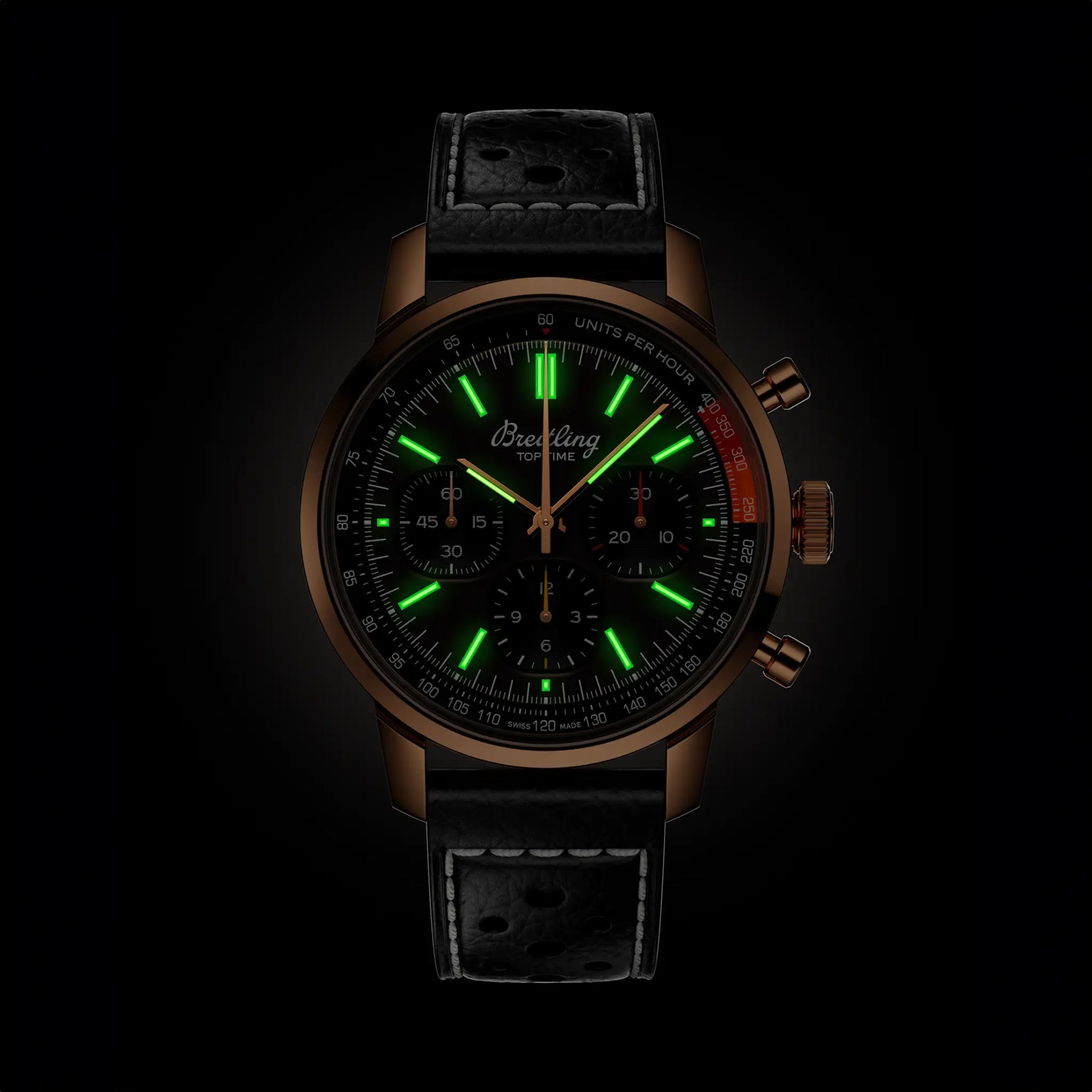 Breitling Top Time B01 reference RB01761A1Q1X1 with Bronze dial, 18k red gold case, calfskin strap, illuminated dial view