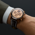 Breitling Navitimer B19 Chronograph 43 Perpetual Calendar 140th Anniversary reference RB19101A1H1P1 with Solid gold dial, 18k red gold case, alligator strap, on-wrist view