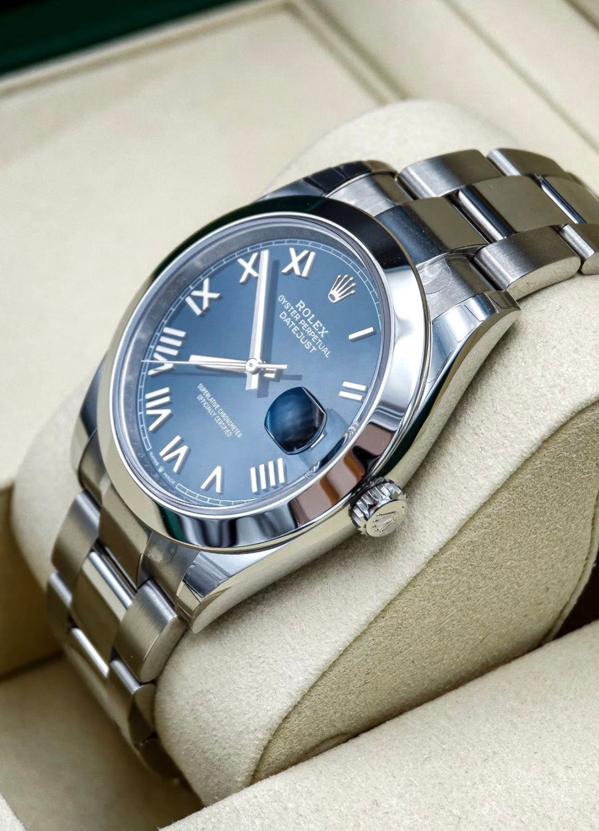 Rolex Datejust 41 126300 unworn 2026 bright blue Roman dial on Oyster bracelet, crown side view
