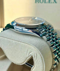 Rolex Datejust 41 126300 unworn 2026: Side profile of the polished Oystersteel case and smooth bezel