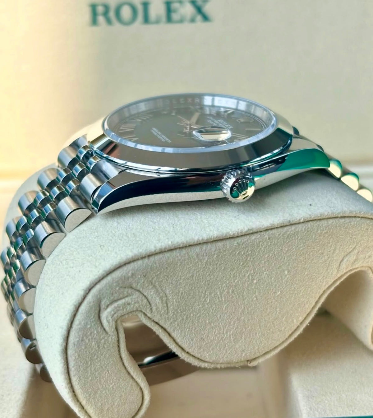 Rolex Datejust 41 126300 unworn 2026: Crown-side view showing the Twinlock crown and Jubilee bracelet