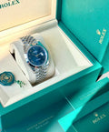 Rolex Datejust 41 126300 unworn 2026: Watch in Rolex presentation box with the photographed booklets and green seal