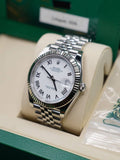 Angled crown-side view of Rolex Datejust 41 126334-0036 showing white Roman dial and fluted bezel