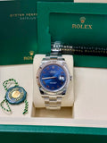 Unworn 2026 Rolex Datejust 41 126334-0037, new bright blue Roman dial, fluted bezel and Oyster bracelet — watch in presentation box