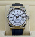 2026 Rolex Sky-Dweller with white dial, fluted bezel and black Oysterflex bracelet, front view in presentation box