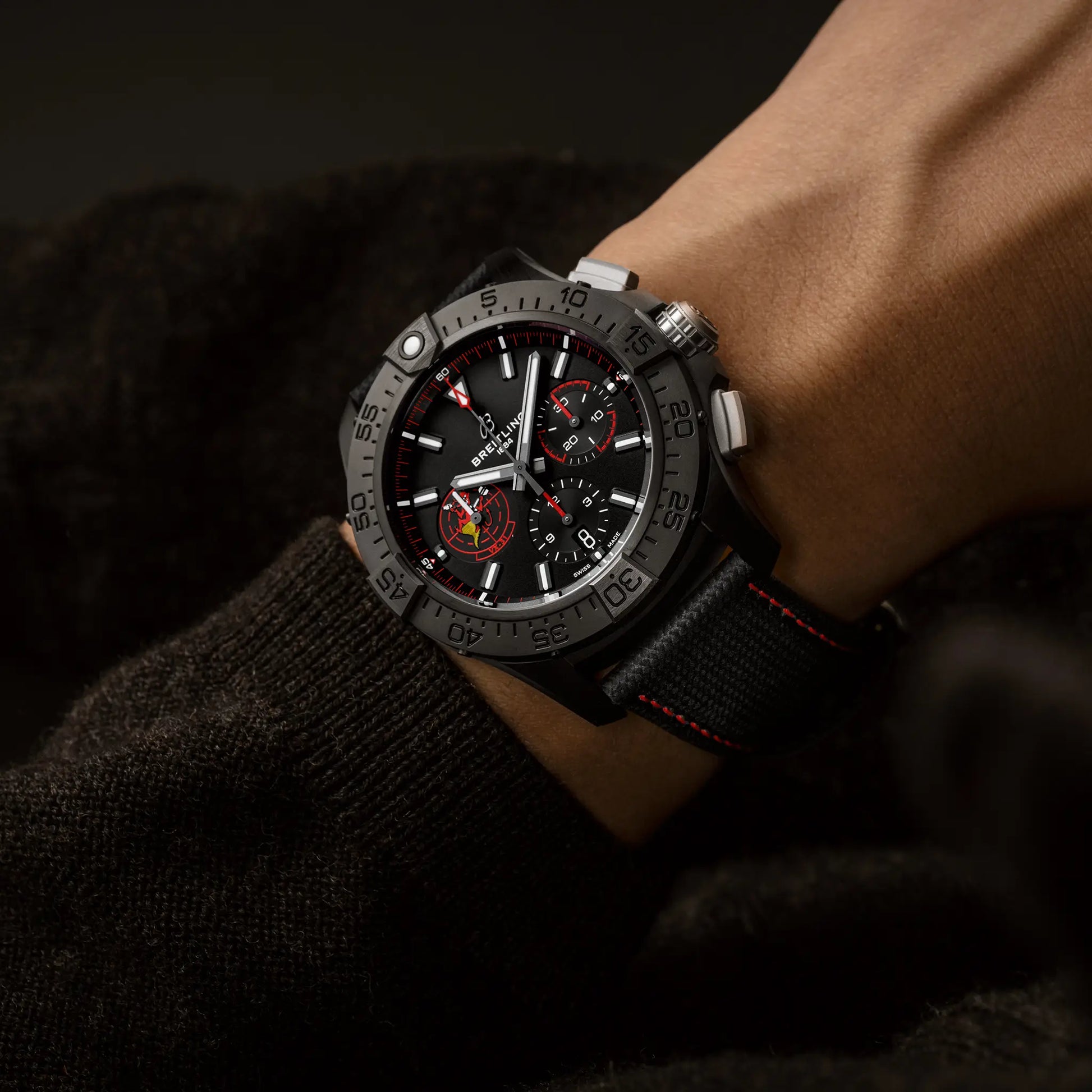 Breitling Avenger B01 Chronograph 44 Night Mission Dust Devils reference SB01473A1B1X1 with Black dial, Ceramic case, calfskin strap, on-wrist view