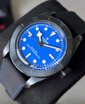 Tudor Black Bay Ceramic Blue M79210CNU-0007, angled view of the blue dial, ceramic bezel and hybrid strap