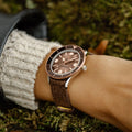 Breitling Superocean Heritage '57 Highlands reference U10340E31A1A1 with Beige dial, Stainless steel & 18k red gold case, bracelet, on-wrist view