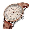Breitling Navitimer Automatic 41 reference U17329F41G1P1 with Cream dial, Stainless steel & 18k red gold case, alligator strap, three-quarter view