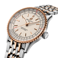 Breitling Navitimer Automatic 41 reference U17329F41G1U1 with Cream dial, Stainless steel & 18k red gold case, bracelet, three-quarter view
