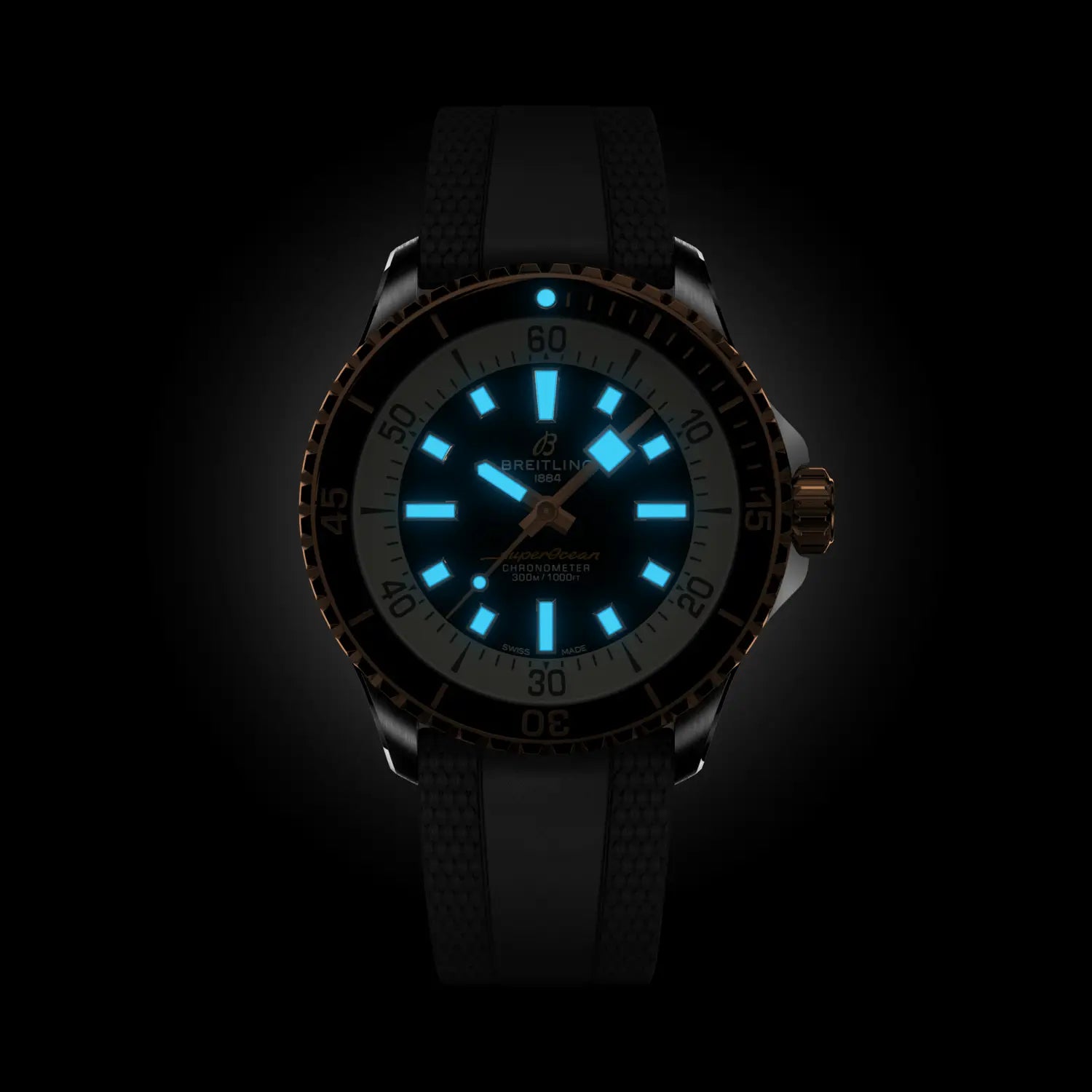 Breitling Superocean Automatic 42 reference U17375211B1S1 with Black dial, Stainless steel & 18k red gold case, rubber strap, illuminated dial view