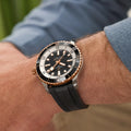 Breitling Superocean Automatic 42 reference U17375211B1S1 with Black dial, Stainless steel & 18k red gold case, rubber strap, on-wrist view