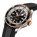 Breitling Superocean Automatic 42 reference U17375211B1S1 with Black dial, Stainless steel & 18k red gold case, rubber strap, three-quarter view