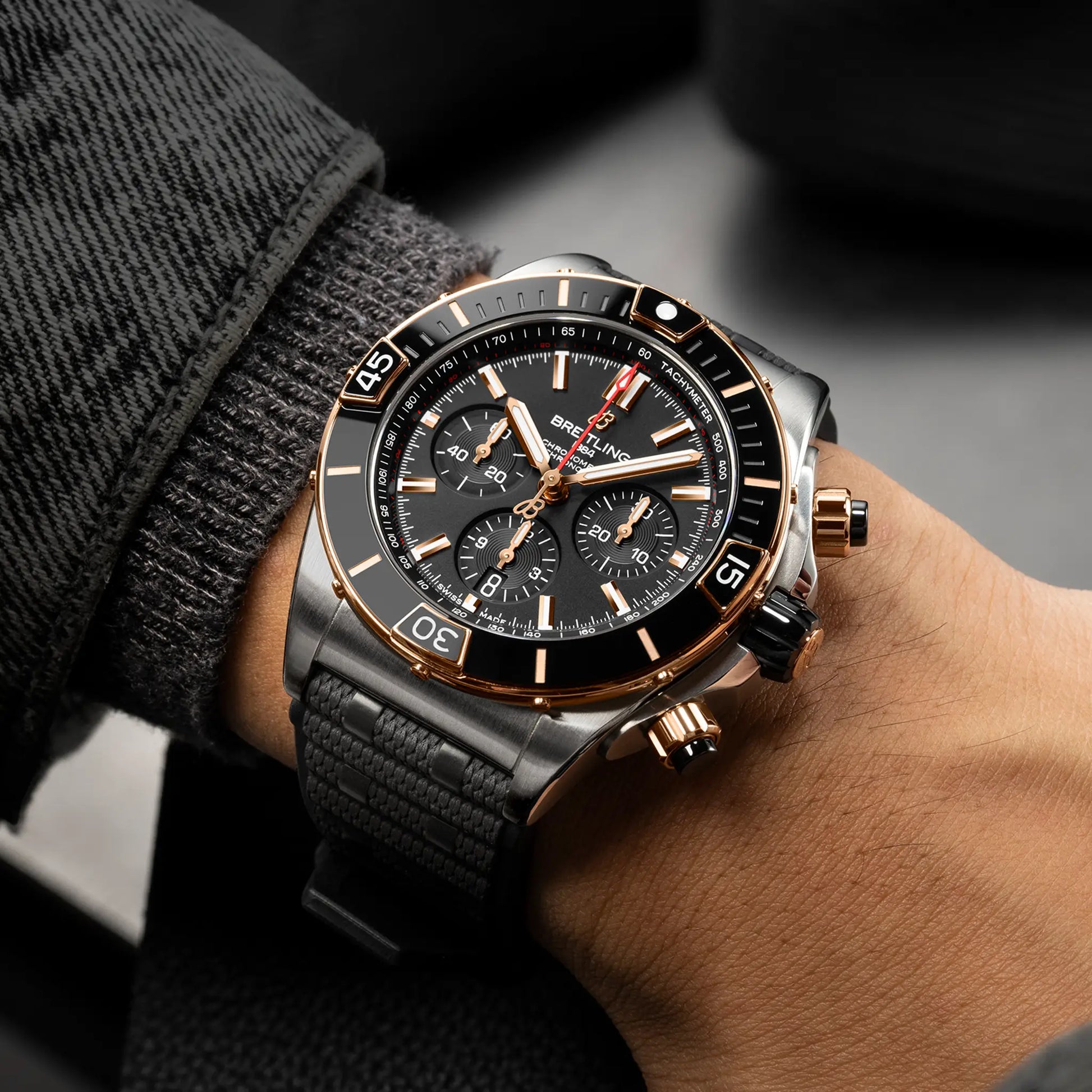 Breitling Super Chronomat B01 44 reference UB0136251B1S1 with Black dial, Stainless steel & 18k red gold case, black rubber strap, on-wrist view