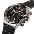 Breitling Super Chronomat B01 44 reference UB0136251B1S1 with Black dial, Stainless steel & 18k red gold case, black rubber strap, three-quarter view