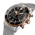 Breitling Superocean Heritage B01 Chronograph 42 reference UB0156H11B1A1 with Black dial, Stainless steel & 18k red gold case, bracelet, three-quarter view