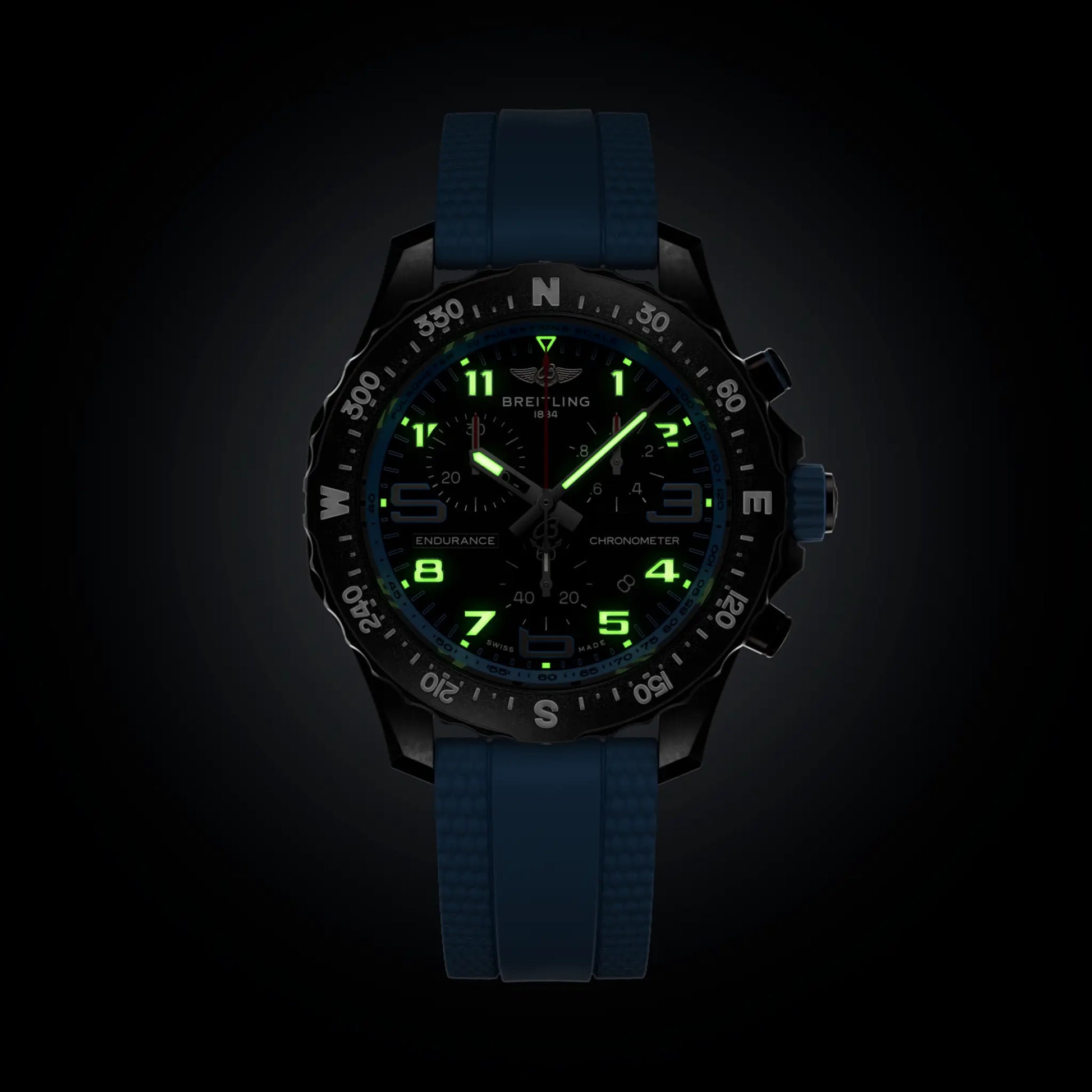 Breitling Endurance Pro 38 reference X83310281B1S1 with Black dial, Breitlight® case, blue rubber strap, illuminated dial view