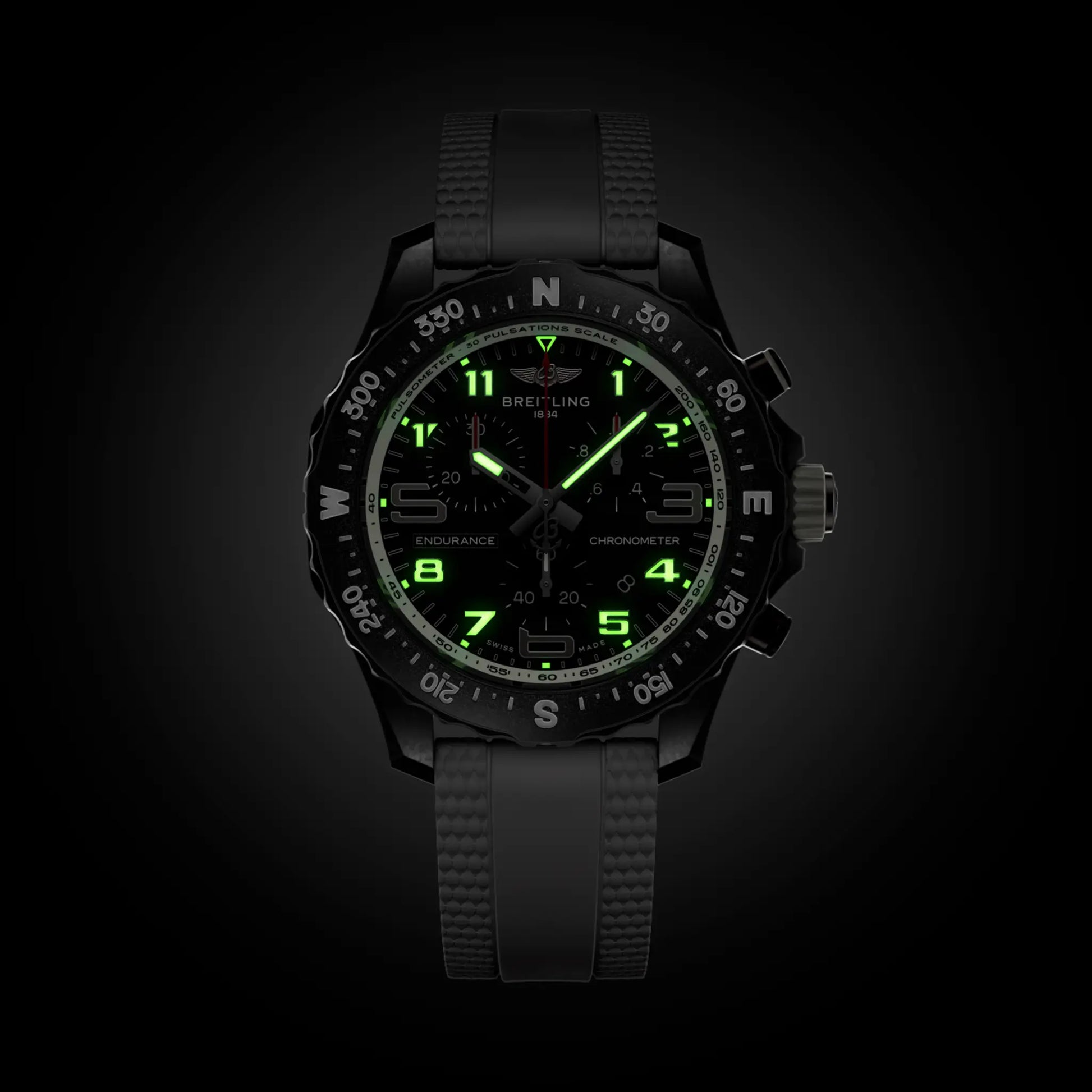 Breitling Endurance Pro 38 reference X83310A71B1S1 with Black dial, Breitlight® case, white rubber strap, illuminated dial view